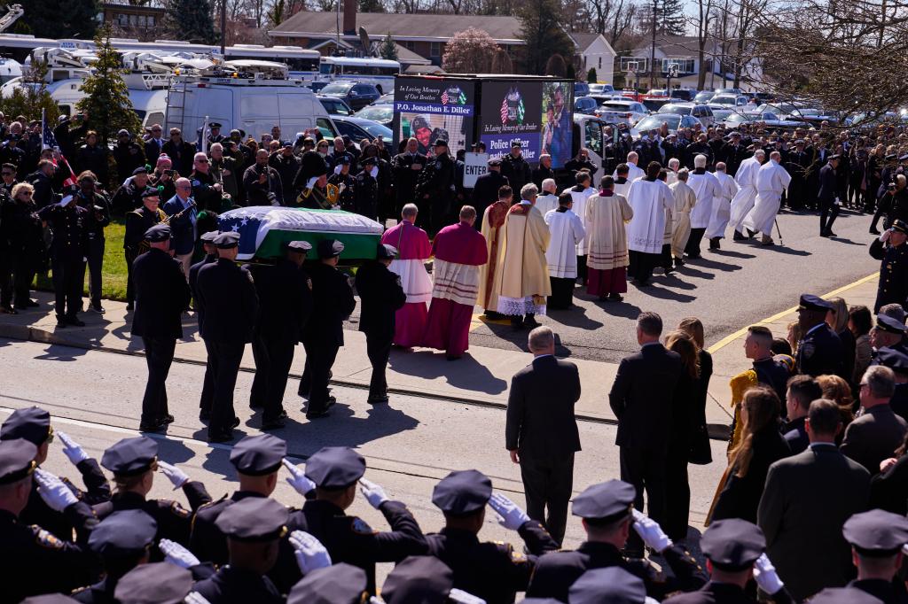 Pallbearers carrying Diller's casket into St. Rose of Lima Roman Catholic Church on March 30, 2024.