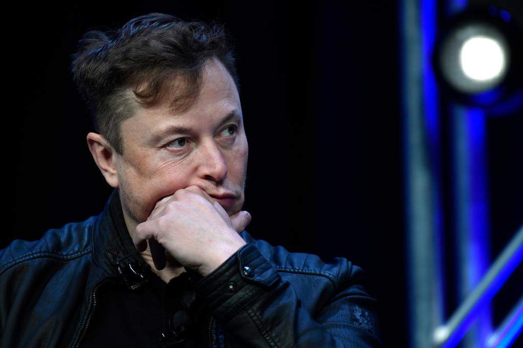 Elon Musk, CEO of Tesla and SpaceX, thoughtfully addressing the audience at the SATELLITE Conference and Exhibition in Washington, March 9, 2020.