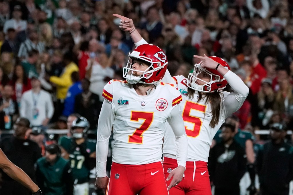 Kansas City Chiefs' kicker Harrison Butker (L) and Kansas City Chiefs' punter Tommy Townsend watch the ball during Super Bowl LVII between the Kansas City Chiefs and the Philadelphia Eagles at State Farm Stadium in Glendale, Arizona, on February 12, 2023.