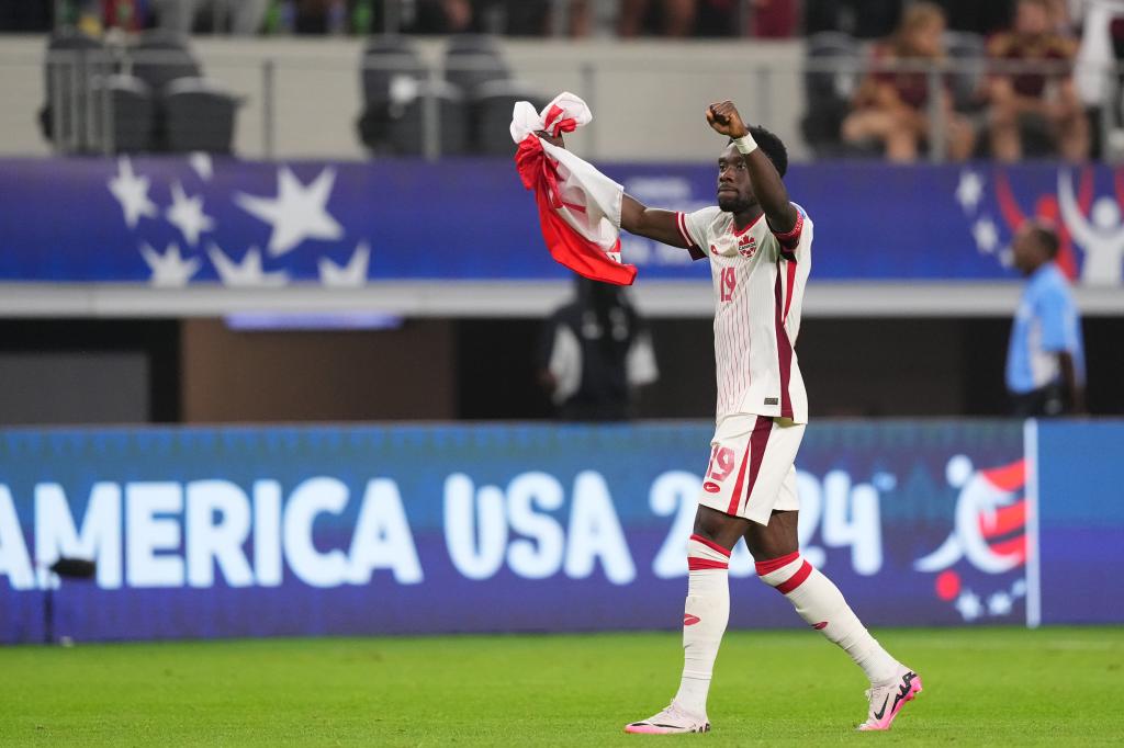 Alphonso Davies of Canada celebrates the victory after the CONMEBOL Copa America 2024 quarter-final match between Venezuela and Canada at AT&T Stadium on July 5, 2024.