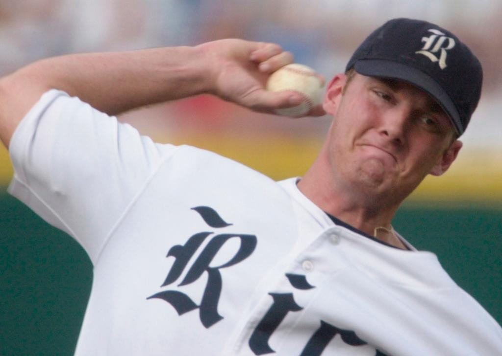 Rice pitcher Philip Humber delivers against Stanford in the first inning of the third and final game of the College World Series best-of-three championship series in Omaha, Neb., Monday, June 23, 2003. Humber was drafted by the New York Mets Monday, June 7, 2004.