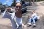 Enraged Florida woman goes ballistic in parking lot, swings at YouTuber filming and is knocked to the ground