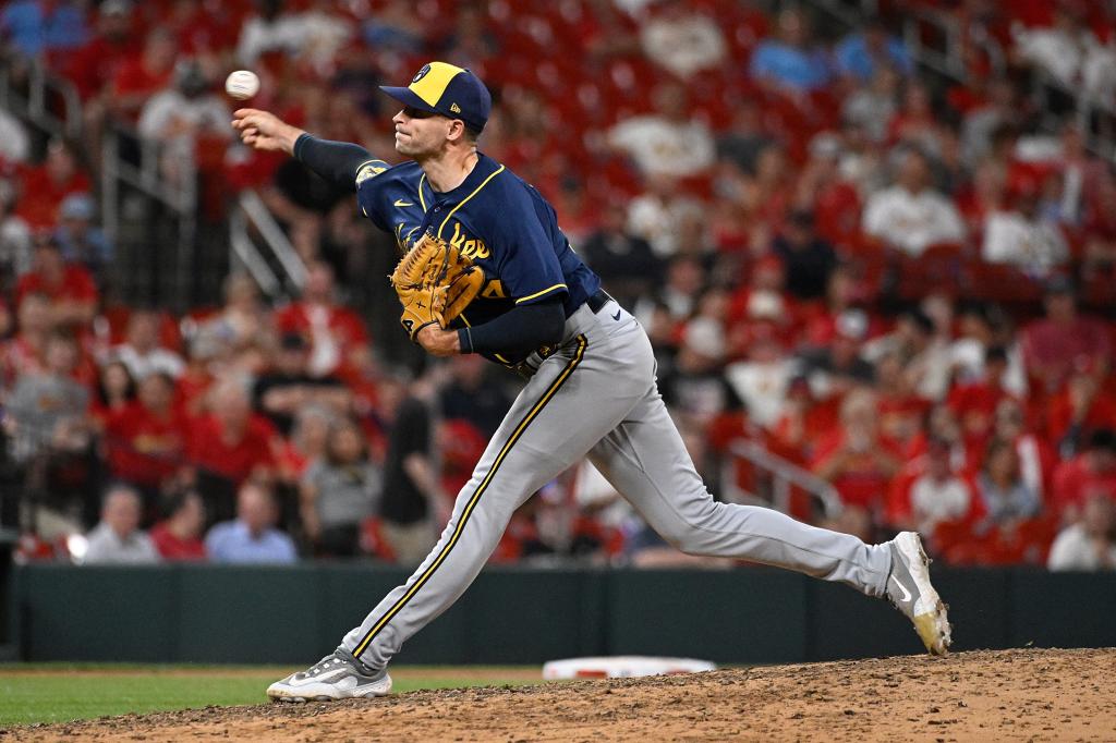 Jake Cousins #54 of the Milwaukee Brewers pitches against the St. Louis Cardinals in the eighth inning at Busch Stadium on May 17, 2023 in St Louis, Missouri. 