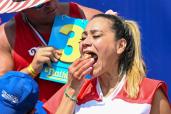 Defending champion Miki Sudo competes during the 2023 Nathan's Famous Fourth of July International Hot Dog Eating Contest at Coney Island on July 04, 2023.