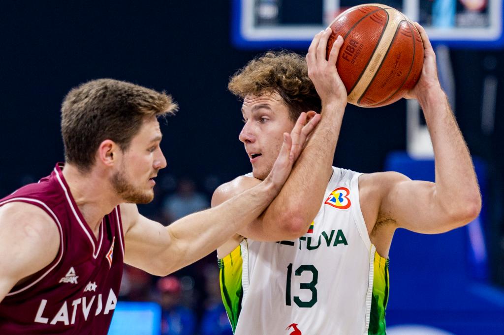 Rokas Jokubaitis #13 of Lithuania controls the ball during the FIBA Basketball World Cup Classification 5-6 game between Latvia and Lithuania at Mall of Asia Arena on September 09, 2023 in Manila, Philippines. 