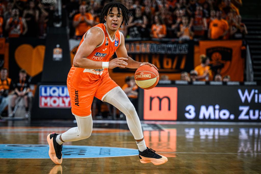 Pacome Dadiet of ratiopharm ulm controls the Ball during the Basketball Bundesliga Play Off match between Ratiopharm Ulm and Wurzburg Baskets at ratiopharm arena on May 20, 2024 in Neu-Ulm, Germany. 