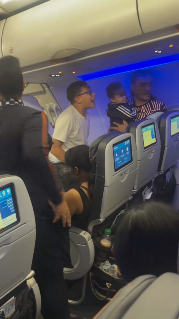 a flight attendant noticed the teen carrying the baby and told the mother that an adult would need to hold the child for the flight and the plane was forced to return to the gate. 