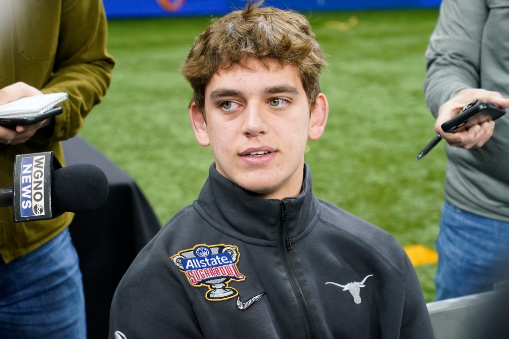 Texas quarterback Arch Manning talks to reporters during media day for the the upcoming Sugar Bowl NCAA college football semifinal game in New Orleans, Saturday, Dec. 30, 2023. 