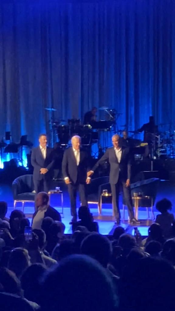 Former President Barack Obama, President Biden and Jimmy Kimmel during a Democratic fundraiser for Biden’s reelection campaign in June, in which Obama was seen grabbing Biden’s hand to lead him offstage.