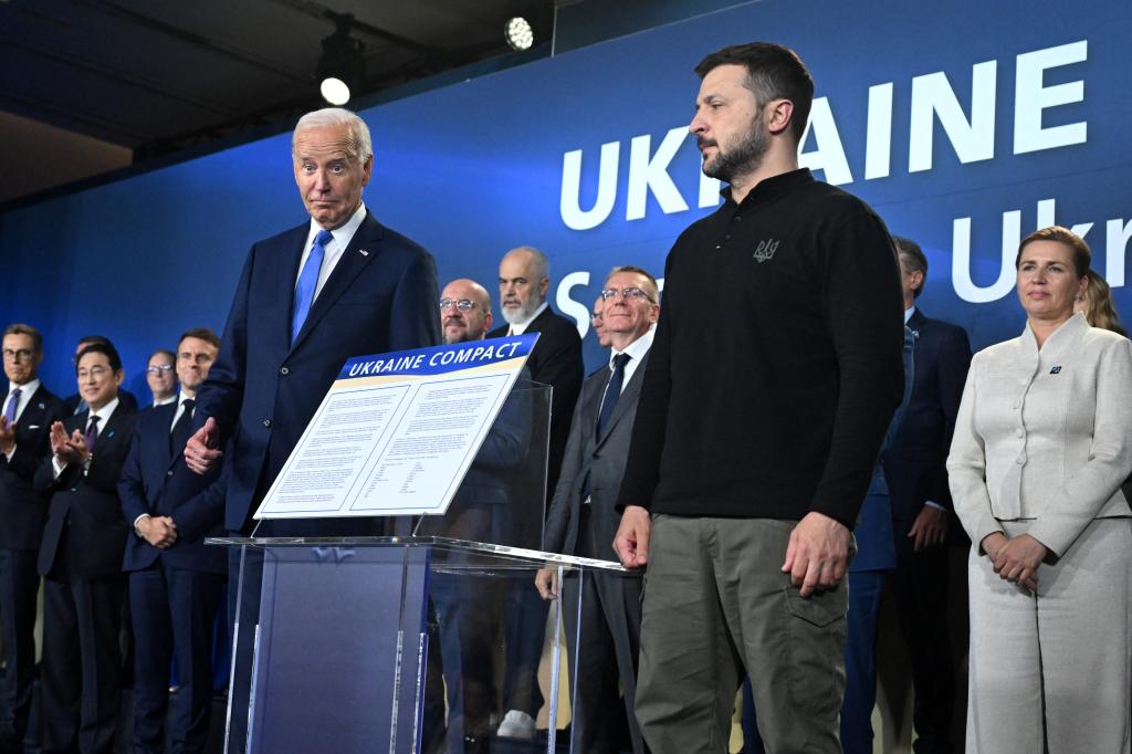 Biden and Ukraine's President Volodymyr Zelensky attend the Ukraine Compact initiative on Thursday.