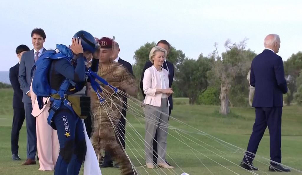 Biden briefly wandering while leaders watch a parachute drop at San Domenico Golf Club during day one of the 50th G7 summit on June 13, 2024 in Fasano, Italy.