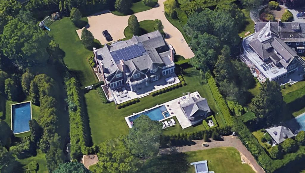 An $8 million large house with a pool and trees in Water Mill, NY, where Brandon Miller was found unconscious due to carbon monoxide poisoning.