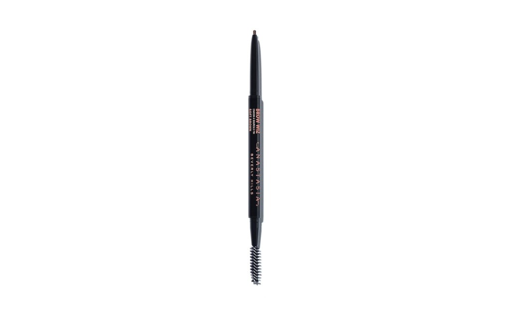 A black eyebrow pencil with a brush