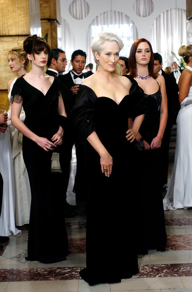 Meryl Streep, Anne Hathaway, Emily Blunt, and Belle Shouse in black dresses from the film 'The Devil Wears Prada', 2006