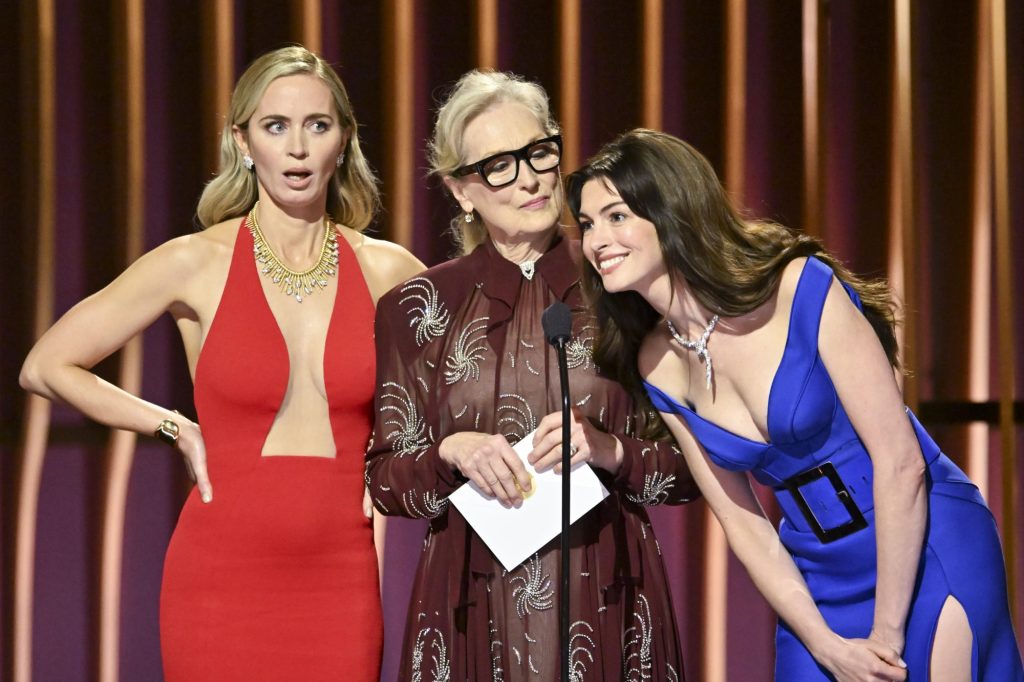 Emily Blunt, Meryl Streep, and Anne Hathaway speaking onstage at the 30th Annual Screen Actors Guild Awards in Los Angeles, California