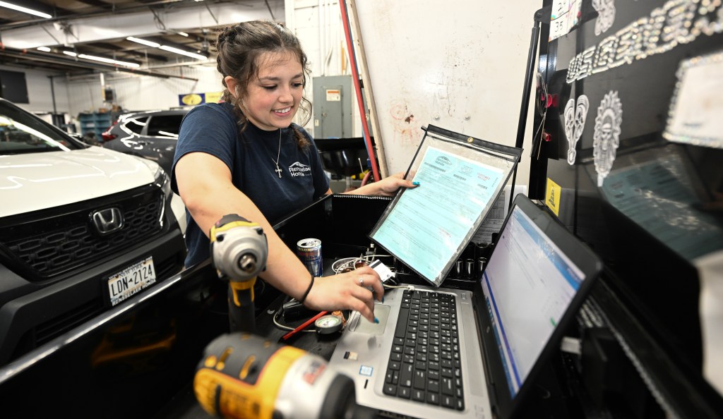 Emiley Filuta working on a computer