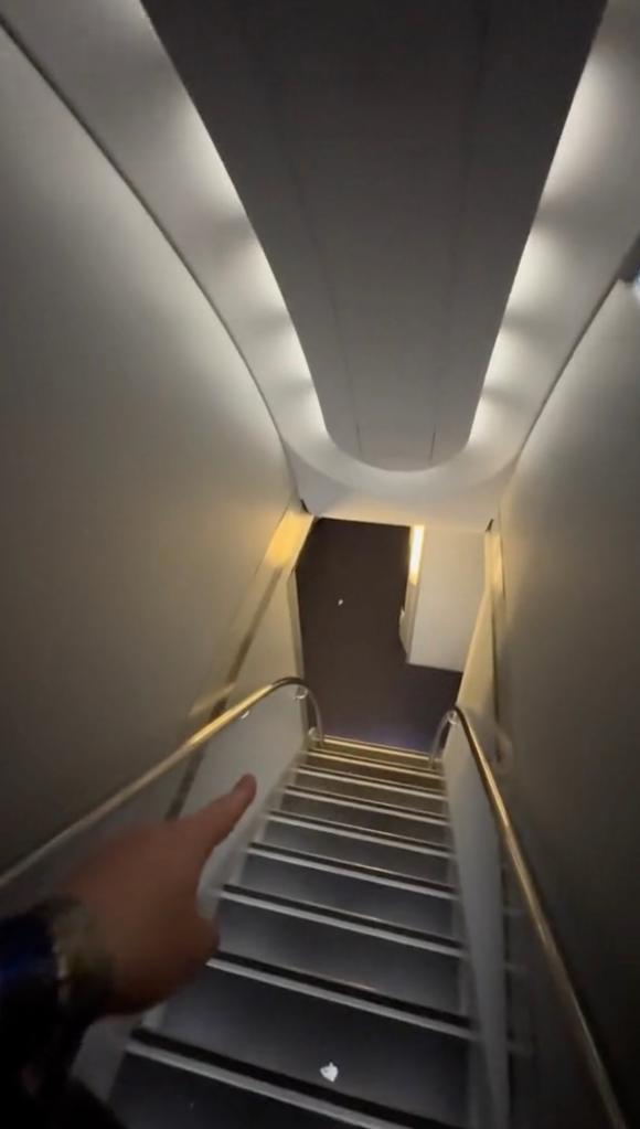 The stairs leading to the lavatory.