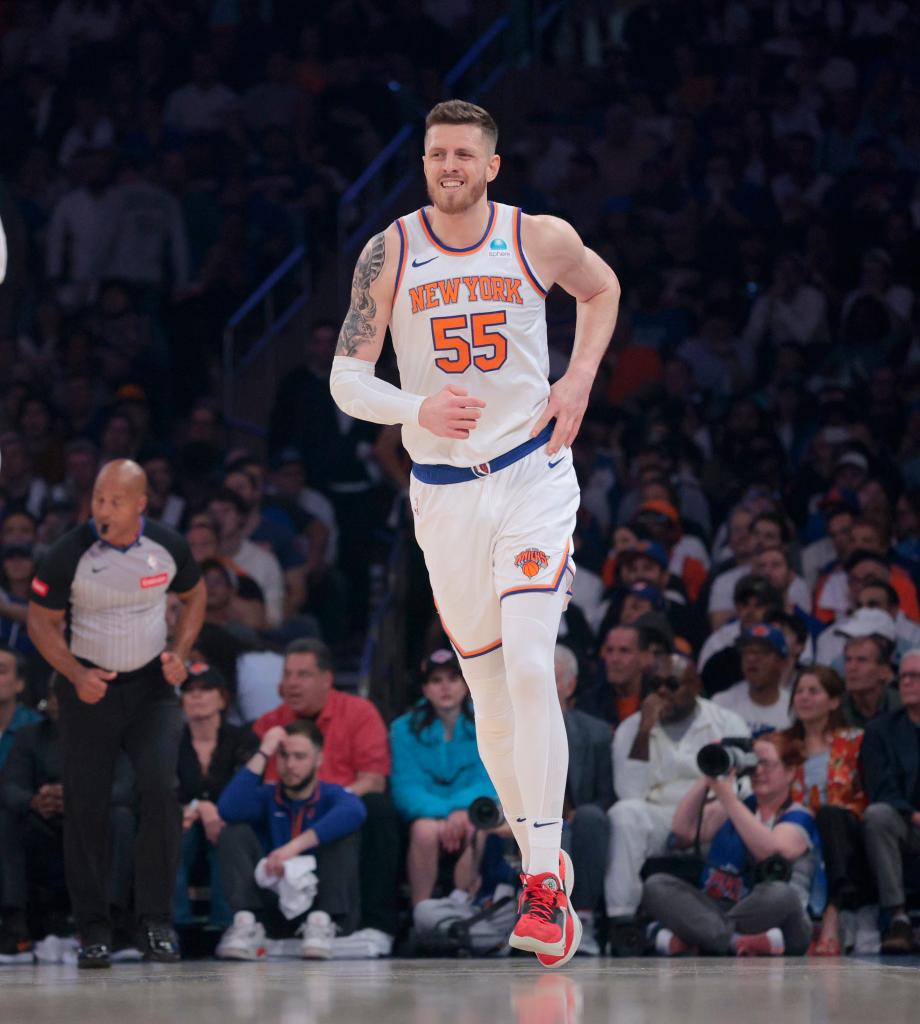 Knicks center Isaiah Hartenstein #55 is all smiles as he runs down court after scoring during the first quarter against the Pacers in Game 7 of the second round of the playoffs on May 19, 2024.