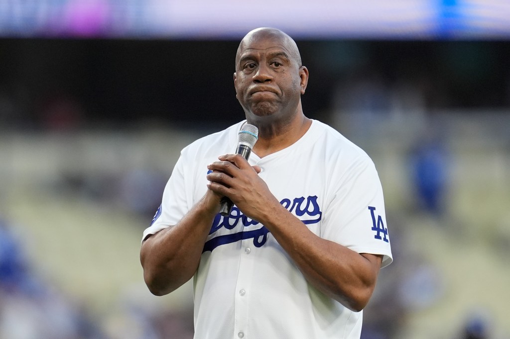 Magic Johnson is pictured before a Dodgers game in April.