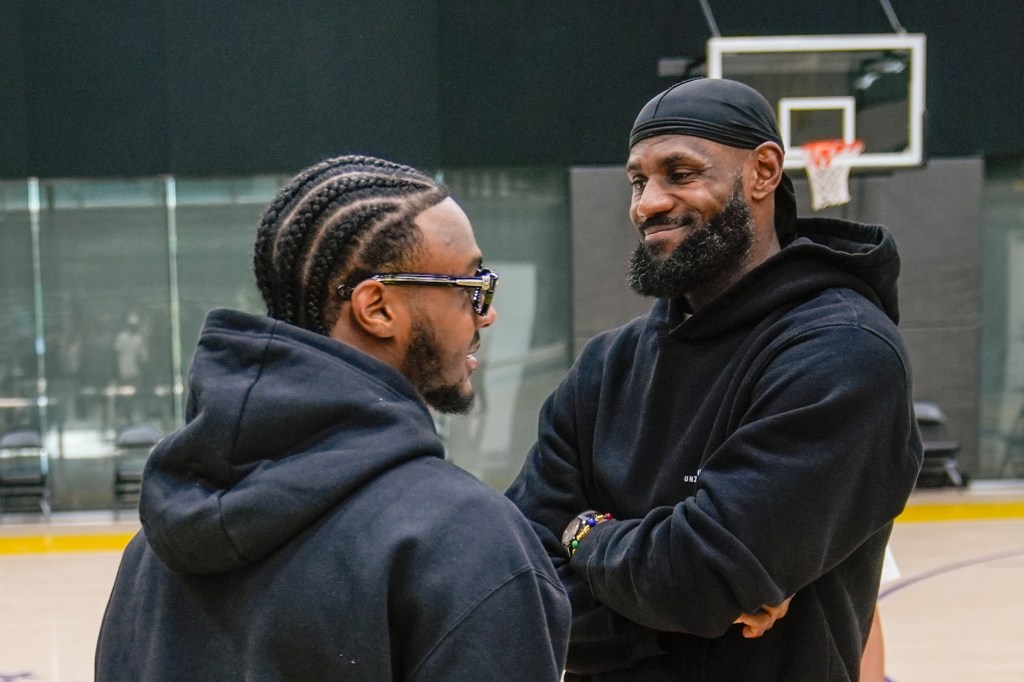 LeBron James with his son Bronny during a Lakers news conference on Tuesday.