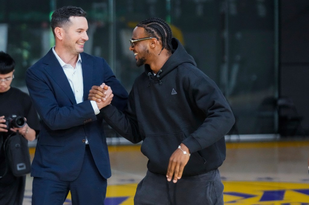 Lakers coach JJ Redick and Bronny James.
