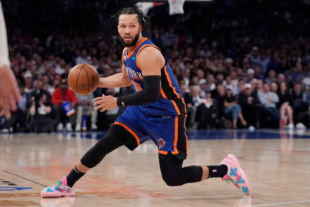 New York Knicks' Jalen Brunson looks to pass  the ball during the second half of Game 5 in an NBA basketball second-round playoff series against the Indiana Pacers.