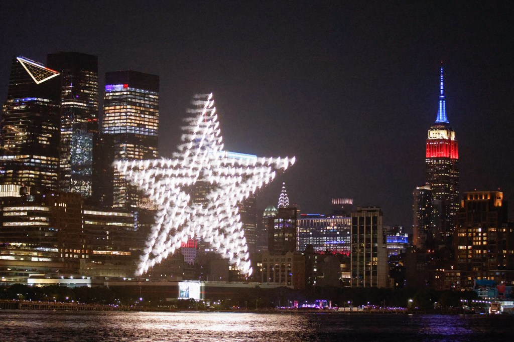 A drone show lights up in the shape of a star during the annual Fourth of July celebration over the Hudson River on July 4, 2024.