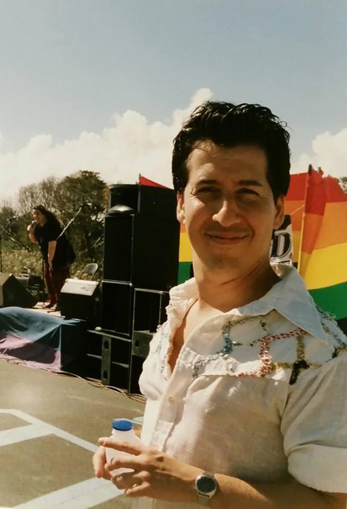 Danny Cohen with a pride flag