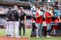 Yankees-Reds game delayed by national anthem standoff in bizarre scene