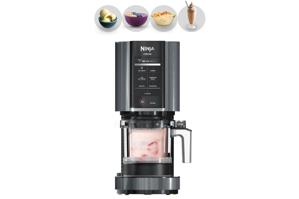 A blender filled with various types of food.