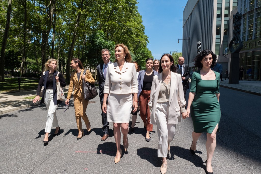 Founder Nicole Daedone and head of sales Rachel Cherwitz exiting Brooklyn Federal Court after a pretrial appearance for charges related to running OneTaste