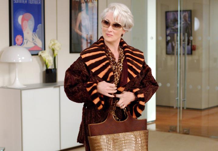 Meryl Streep in a brown and white coat in a scene from 'The Devil Wears Prada', a film for which she was nominated for Best Actress at the 79th annual Academy Awards