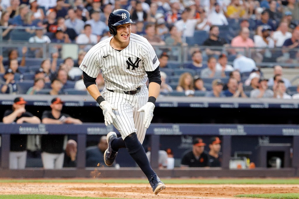 Ben Rice grins after recording a hit at Yankee Stadium.