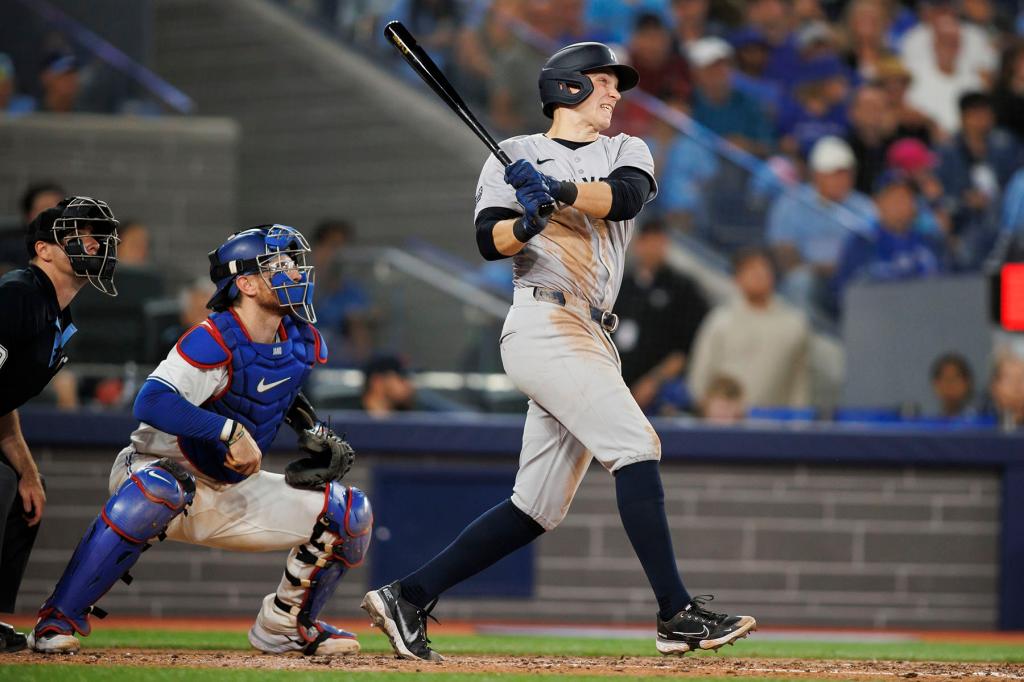 Ben Rice #93 of the New York Yankees hits an RBI double to score in Alex Verdugo #24 in the sixth inning of their MLB game against the Toronto Blue Jays at Rogers Centre on June 30, 2024 in Toronto, Ontario, Canada. 