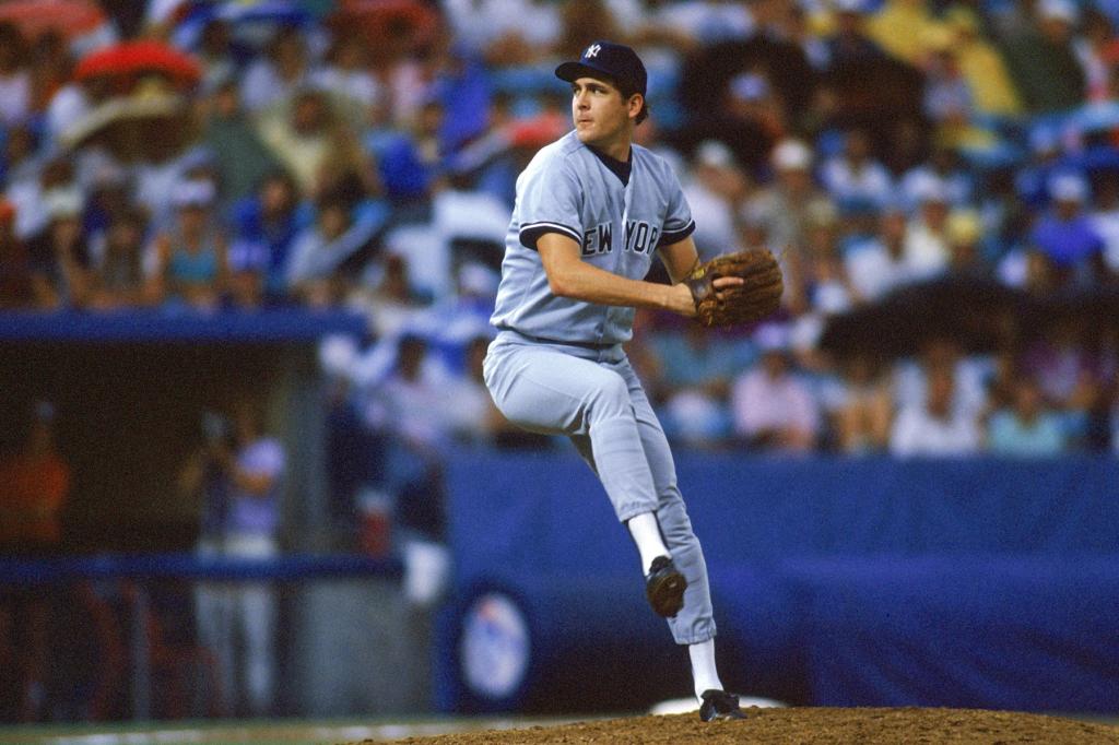 Pitcher Dave Righetti #19 of the New York Yankees pitches during a game in the 1988 season. 