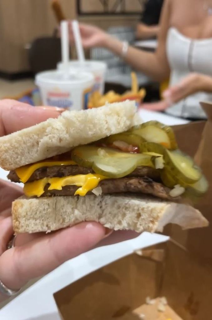 A double cheeseburger with handbag bread.