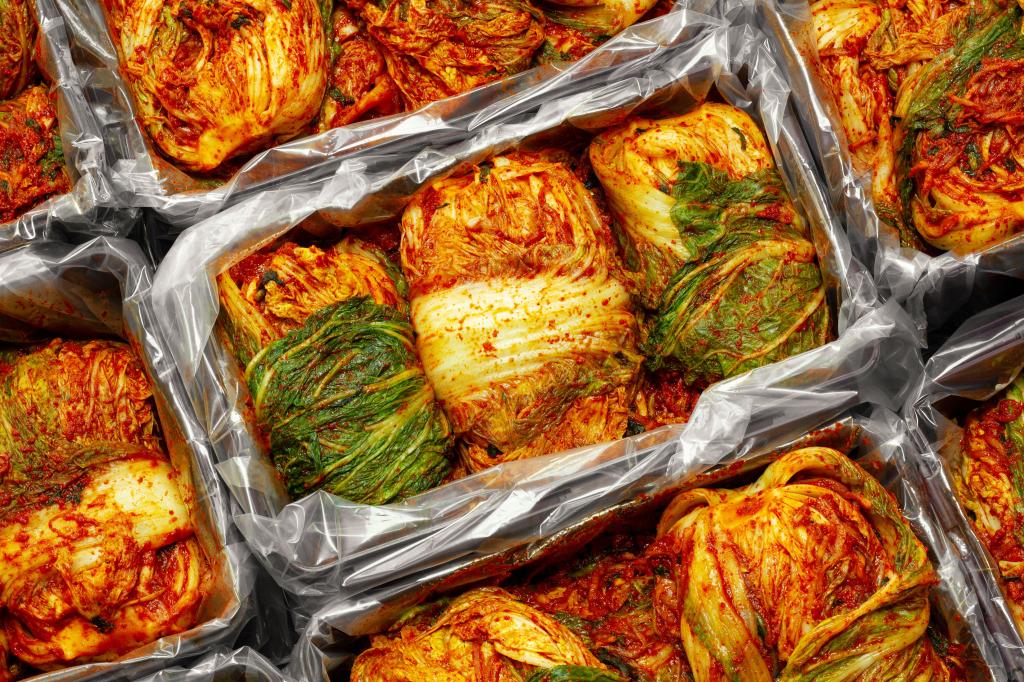 The most famous Korean traditional food Kimchi(napa cabbage) stored in Kimchi container. Make a Kimchi concept. Top view.