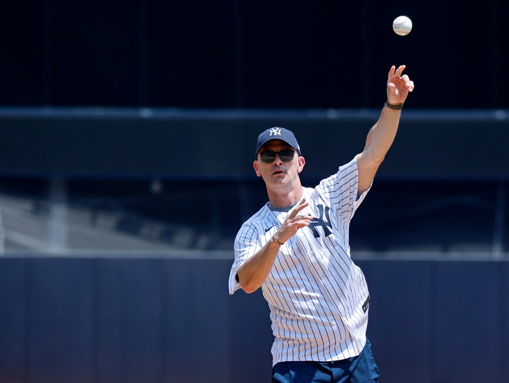 UConn men's basketball head coach Dan Hurley, winner of back-to-back NCAA championships, throwing out the ceremonial first pitch prior to the game.