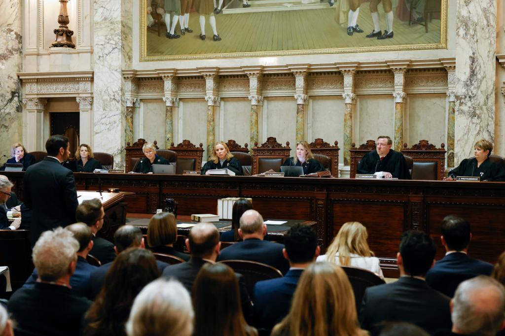 Wisconsin Supreme Court during a redistricting hearing, preparing to decide on a 175-year-old abortion law challenge