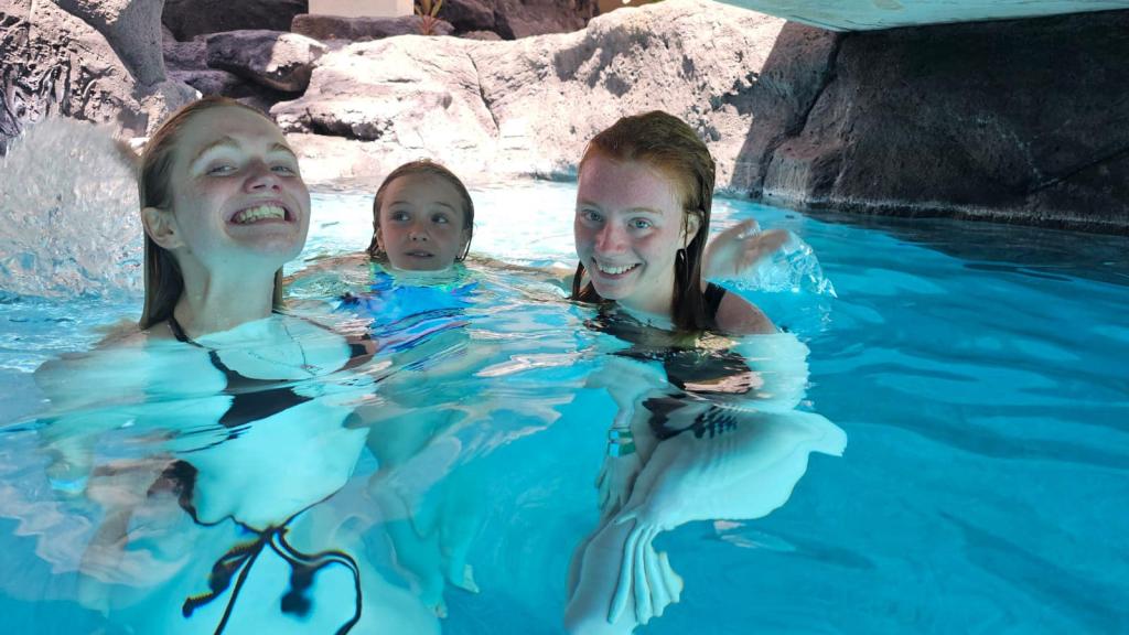 Mamie Laverock with her sisters in a pool. 