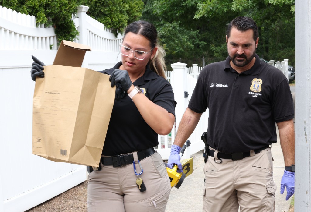 A stunned next door neighbor who would not give her name said she was roused by the screams of a baby and then looked out her window to see police, and what looked like a SWAT team.