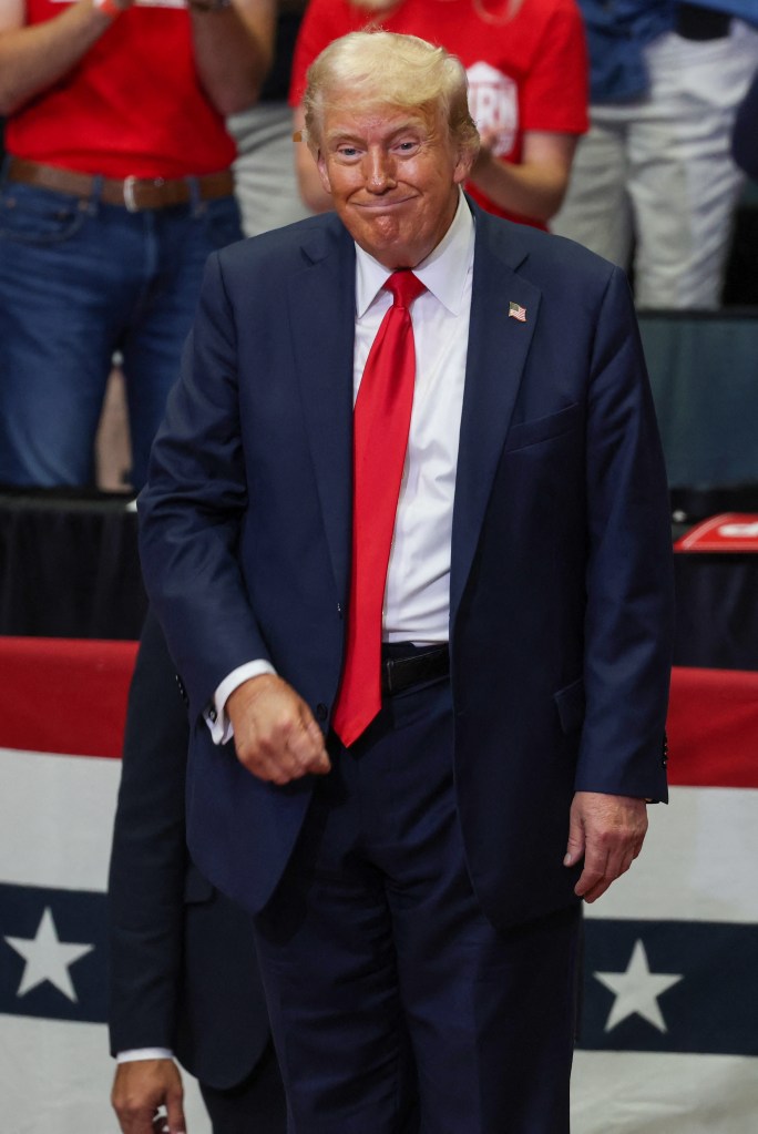 Former US President and 2024 presidential nominee Donald Trump pictured during a campaign rally with US Senator and vice presidential nominee J.D. Vance at Van Andel Arena in Grand Rapids, Michigan, on July 20, 2024