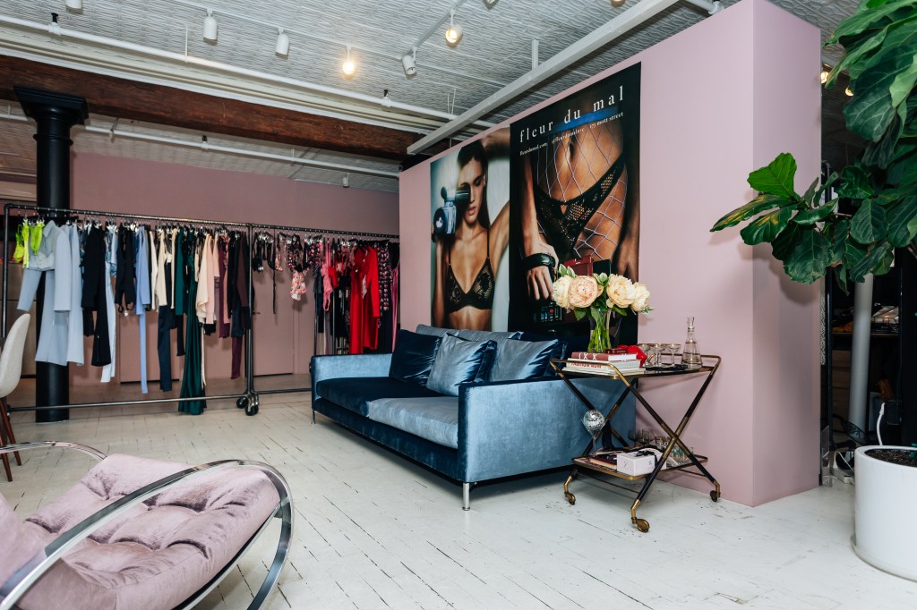 Interior view of Fleur de Mal office in Soho, Manhattan featuring a couch and a poster on the wall, photographed on June 12, 2024.