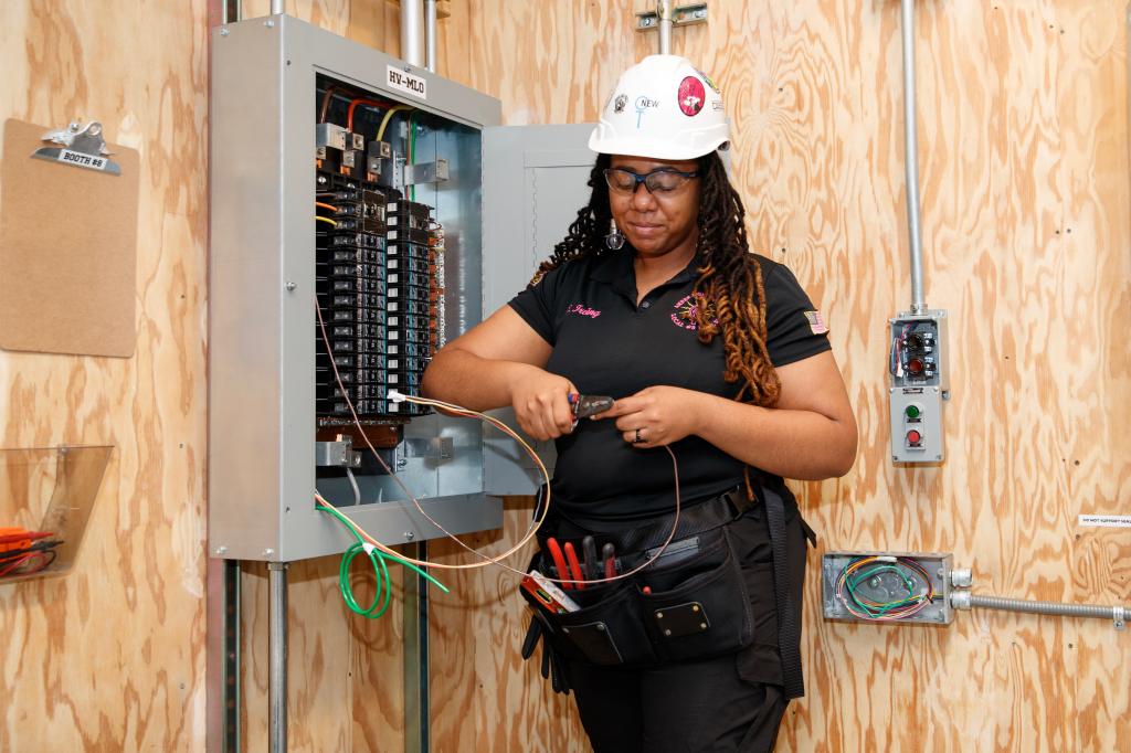 Shauna Irving working on a wire.