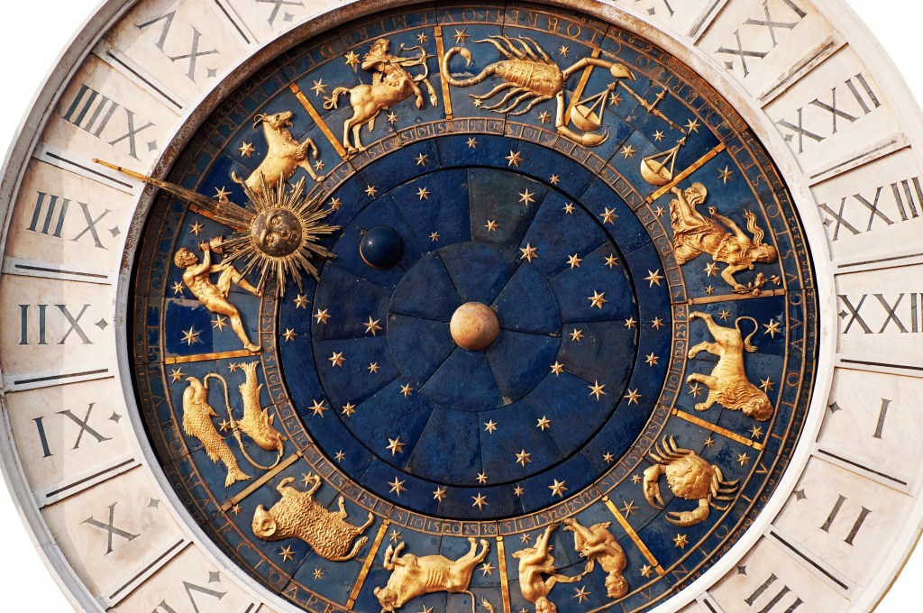 Antique Zodiac clock at the Piazza San Marco in Venice, Italy impacted by full moon