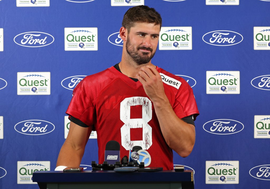 A bearded Daniel Jones talks with the media after the Giants' training camp practice on Aug. 15, 2024.