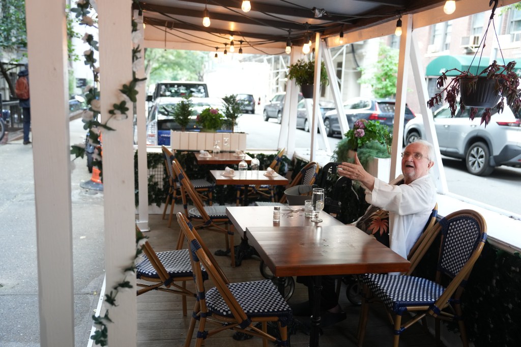 Thomas Grubb, 84, dines at an outdoor dining shed at Arte Cafe on Monday, August 12, 2024 