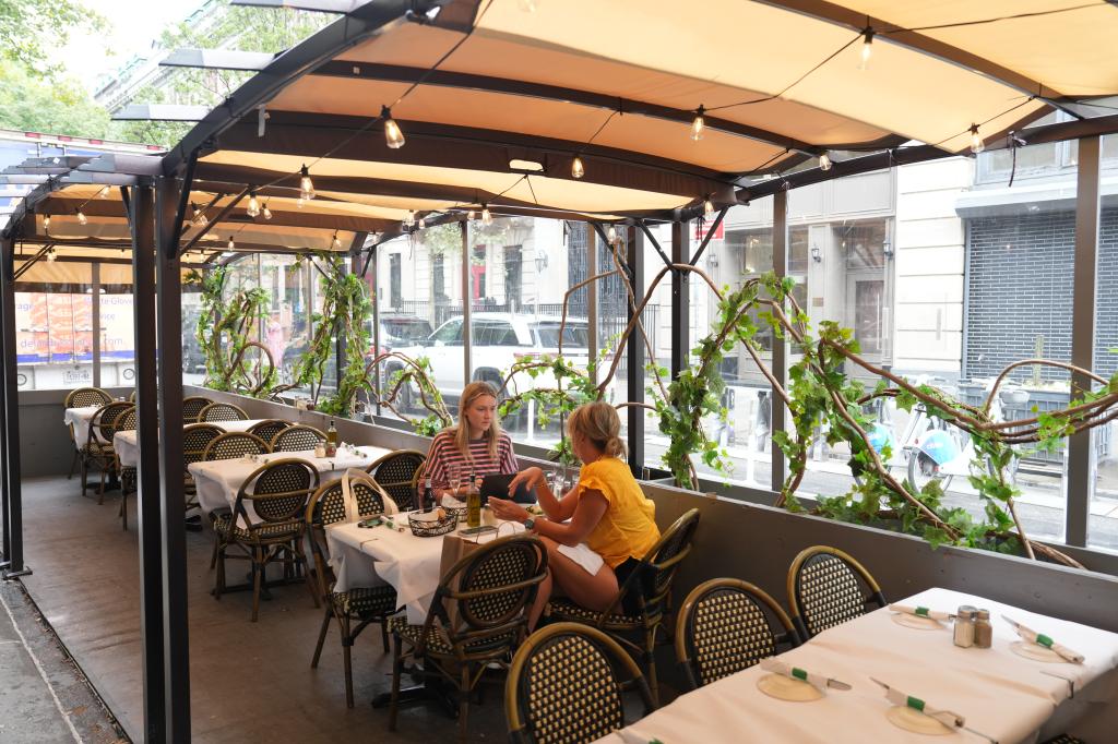 View of an outdoor dining shed at Patsy's Pizzeria.