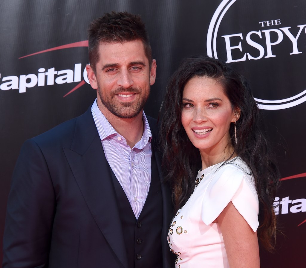 Actress Olivia Munn and NFL player Aaron Rodgers arrive at The 2016 ESPYS