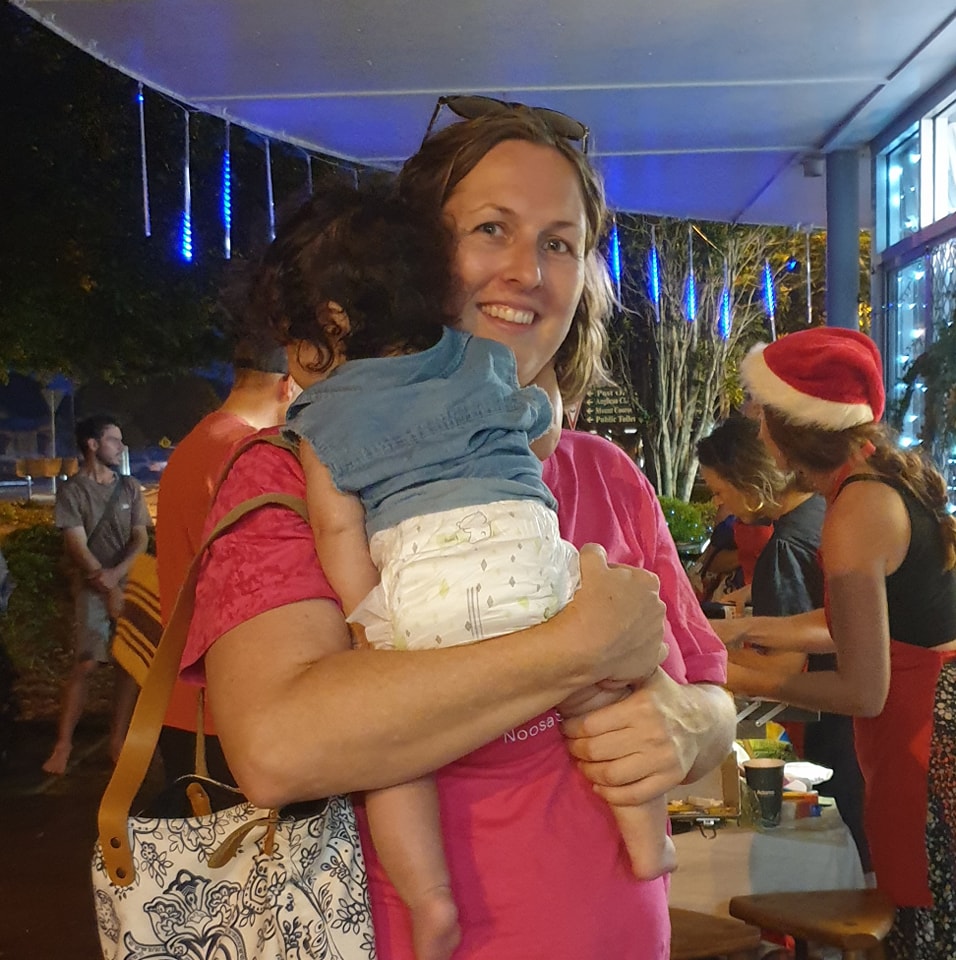 Alecia Staines holding her daughter Miram, known for breastfeeding her friend's twins